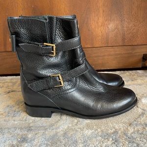 Black leather moto boots with bows and 2 buckles